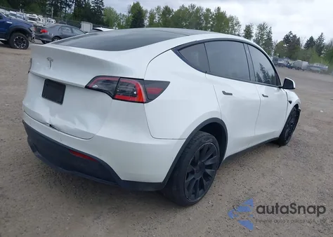 2021 Tesla Model Y Standard Range Rear-Wheel Drive из США, поврежденный, VIN 5YJYGDED9MF121828
